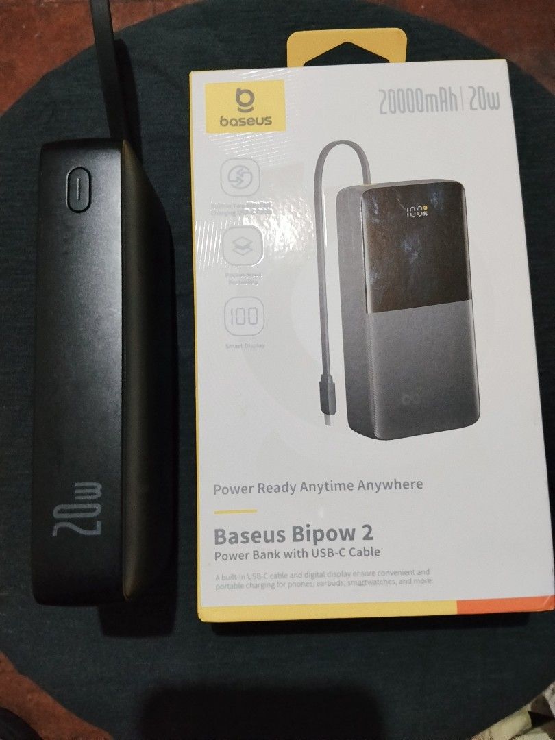 Baseus Bipow 2 20000mAh (Category: Batteries & Power Banks) located in Makati City. Submitted by acunamagbenta (Listing ID 1469934560, Image 2). Description: - Brand/Model: Baseus Bipow 2 20000mAh Power Bank - Color: Black - Key Features: Built-in two-way fast charging USB-C cable and smart digital battery percentage display - Portability: Pocket-sized and travel-friendly with a convenient carrying loop.