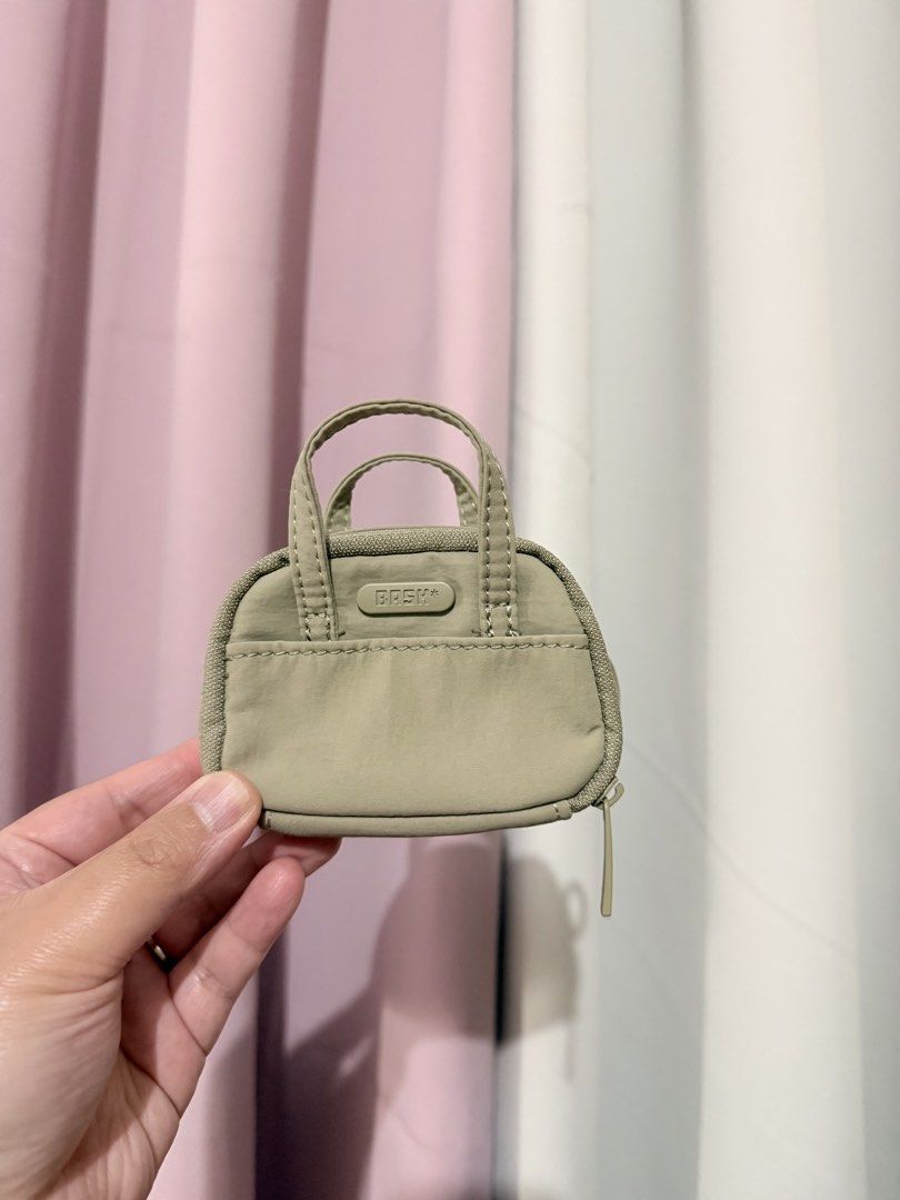 Bash mini weekender dune charm (Category: Wallets & Card holders) located in Tagaytay City. Submitted by denalycoco51 (Listing ID 1469859441, Image 1). Description: Please manage expectations before claiming! 💕 • NO REFUND / NO EXCHANGE — all sales are final. • ITEM CONDITION: Good as new, never been used • Please check all photos & descriptions carefully. • Payment within 24 hours unless otherwise agreed. • Reservations: 1 day only. Unpaid item