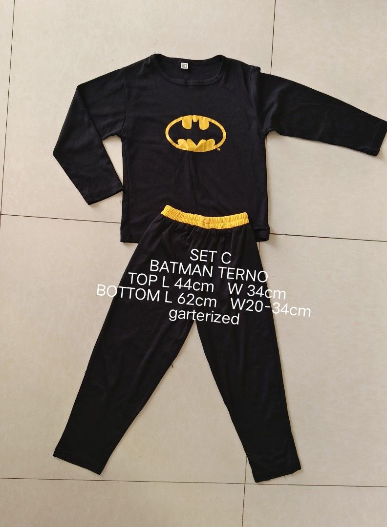 Batman Terno Set C Long Sleeve Top and Pants (Category: Sets or Coordinates) located in Paranaque City. Submitted by pickleandpumpkeen (Listing ID 1469914017, Image 1). Description: - Kids Black Batman terno set - Bold yellow Batman logo on the chest - Matching long sleeves and pants - Comfortable yellow garterized waistband - Ideal for sleepwear or lounge outfits - Refer to the product images for exact measurements payment method: GCASH Shipping