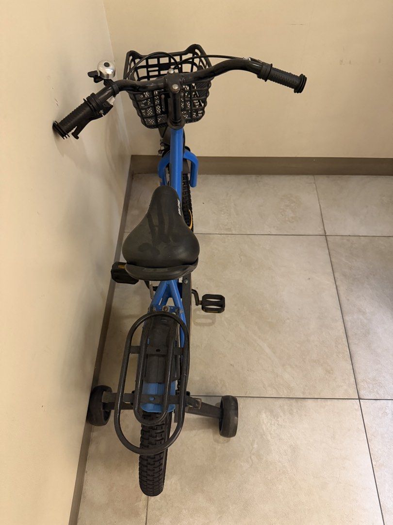 BBLONG Kids Foldable Bicycle with Training Wheels and Basket (Category: Bicycles) located in Manila. Submitted by 17thfinds (Listing ID 1469835115, Image 3). Description: - Brand: BBLONG kids bicycle - Colors available: Blue or Red - Safety features: Training wheels and ankle-protecting chain guard - Accessories included: Front basket, rear rack, and handlebar bell - Perfect starter bike for young children learning to ride 2 colors available.