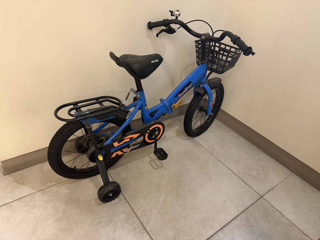 BBLONG Kids Foldable Bicycle with Training Wheels and Basket (Category: Bicycles) located in Manila. Submitted by 17thfinds (Listing ID 1469835115, Image 1). Description: - Brand: BBLONG kids bicycle - Colors available: Blue or Red - Safety features: Training wheels and ankle-protecting chain guard - Accessories included: Front basket, rear rack, and handlebar bell - Perfect starter bike for young children learning to ride 2 colors available.