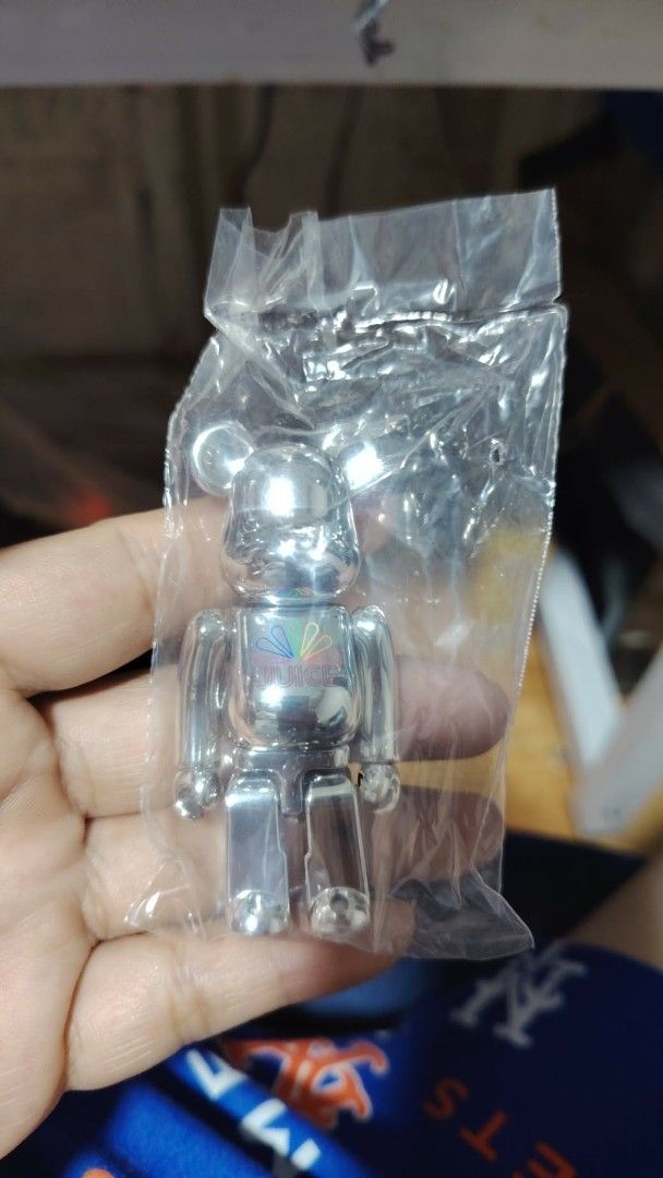 BE@RBRICK Juice Silver Figure (Category: Designer & Blind Box Toys) located in Quezon City. Submitted by dkmadz (Listing ID 1469796157, Image 2). Description: - Authentic BEBRICK x Juice collaboration collectible figure - Eye-catching shiny silver finish with colorful Juice logo on the chest - Brand new and untouched inside original sealed plastic packaging - Includes original white outer box - Perfect for display or as a great addition to any ar