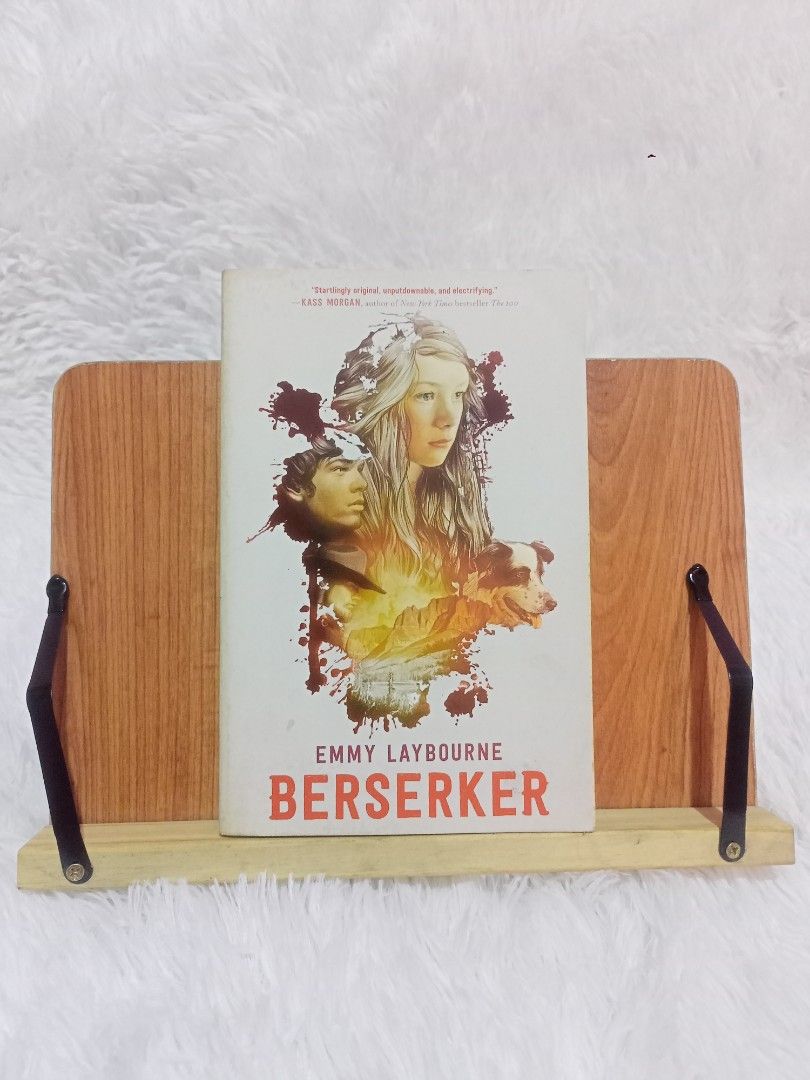 Berserker by Emmy Laybourne Paperback Novel (Category: Storybooks) located in Santa Maria. Submitted by odetothereader (Listing ID 1469773802, Image 1). Description: - Title/Genre: Young adult historical fantasy novel - Setting: 1883 American frontier - Plot: Hanne flees across the frontier with a young cowboy while mastering her ancestral Viking powers - Format: Paperback (Square Fish edition) - Condition: Clean pages with minimal shelf wear.