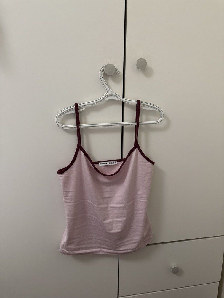 BERSHKA top (Category: Sleeveless) located in Pasig City. Submitted by hotstuff__ (Listing ID 1469836001, Image 1). Description: .