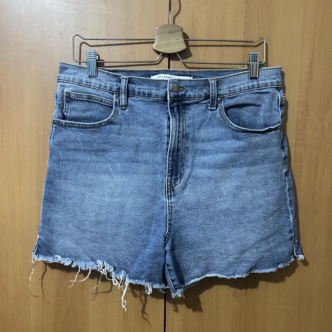 Big Size Denim Shorts Distressed Raw Hem (Category: Shorts) located in Mandaluyong City. Submitted by vwonu (Listing ID 1469860361, Image 1). Description: - Waist: 35-36 -Brand: Celebrity Pink - Wash: Medium wash denim - Fit: High-waisted with zip fly - Design: Classic five-pocket style with raw frayed hem and stylish distressing - Condition: Great casual basic for warmer weather - Feel free to send a message for measurements or inquiries!.