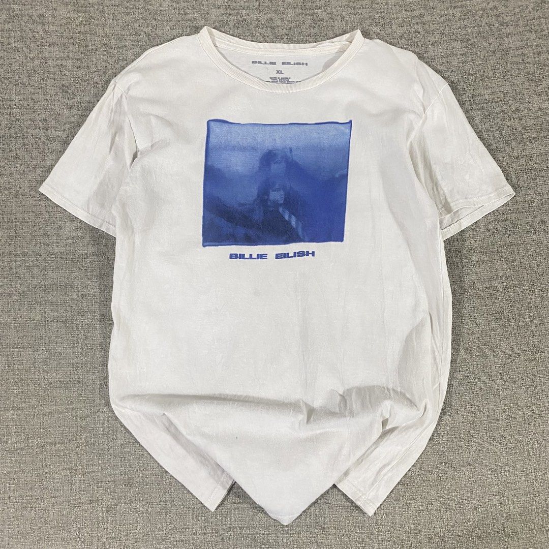 Billie Eilish Official Merch T-shirt (Category: Shirts) located in Los Banos. Submitted by adothrift (Listing ID 1469853721, Image 2). Description: Billie Eilish Official Merch T-shirt Size: S-M Dimensions: Width - 18 Length - 26 .