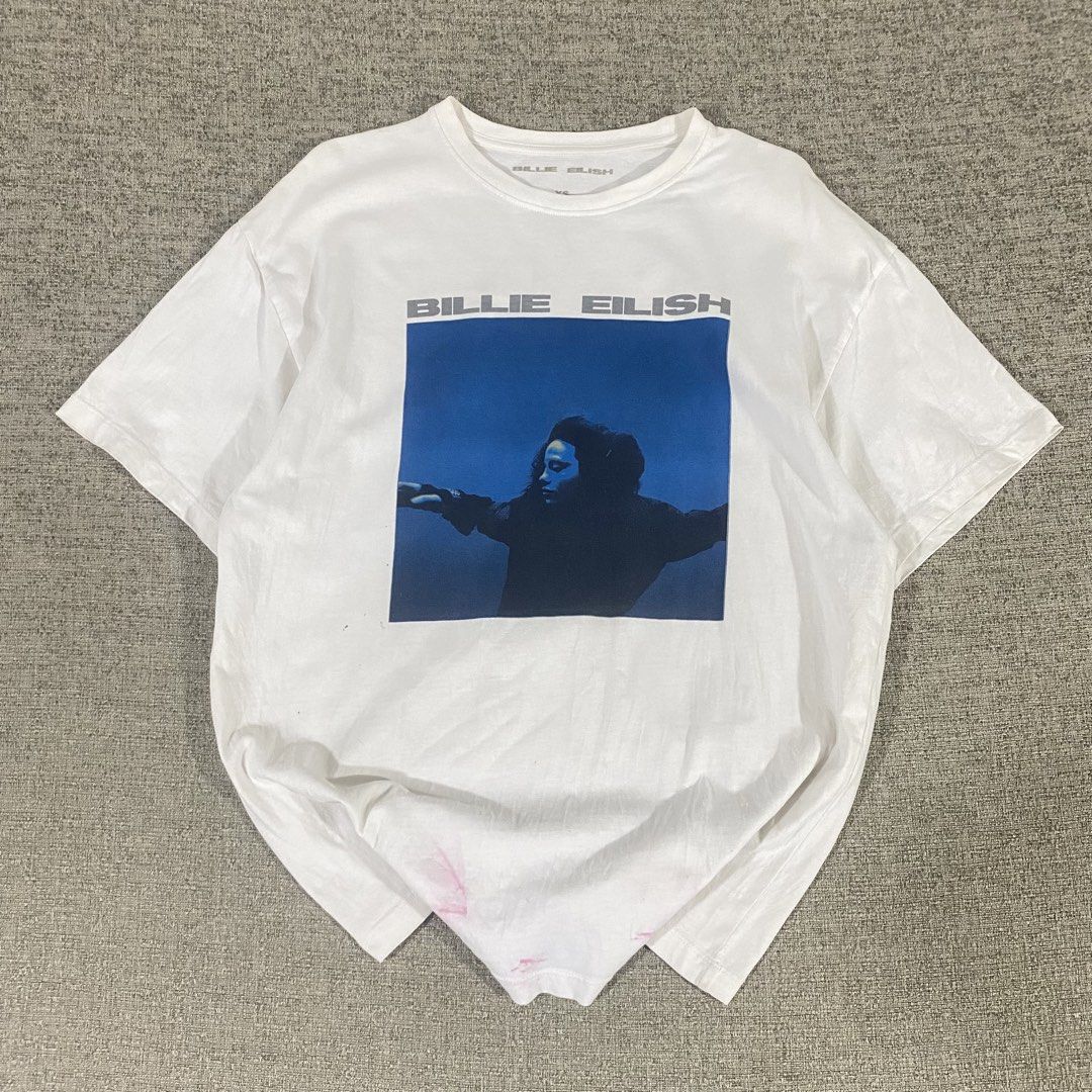 Billie Eilish Official Merch T-shirt (Category: Shirts) located in Los Banos. Submitted by adothrift (Listing ID 1469854044, Image 2). Description: Billie Eilish Official Merch T-shirt Size: M-L Dimensions: Width - 19 Length - 26.