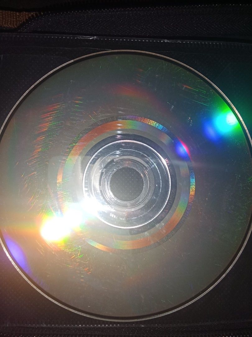 Biohazard Code Veronica Trial Edition Sega Dreamcast Disc (Category: PlayStation) located in Cavite. Submitted by emilgarcia09 (Listing ID 1469910550, Image 2). Description: Biohazard Code Veronica Trial Edition for Sega Dreamcast (JAP Import, T-1214M). Disc only with heavy scratches on the playing side. Top label is clear. Tested and working..