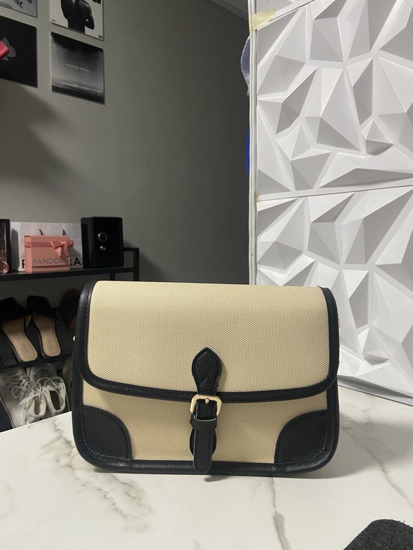 Black & Cream White Shoulder Bag (Category: Shoulder Bags) located in Malolos. Submitted by annemoline_ (Listing ID 1469811105, Image 1). Description: Bought in SM EDSA condition is superb! can lalamove anytime!.