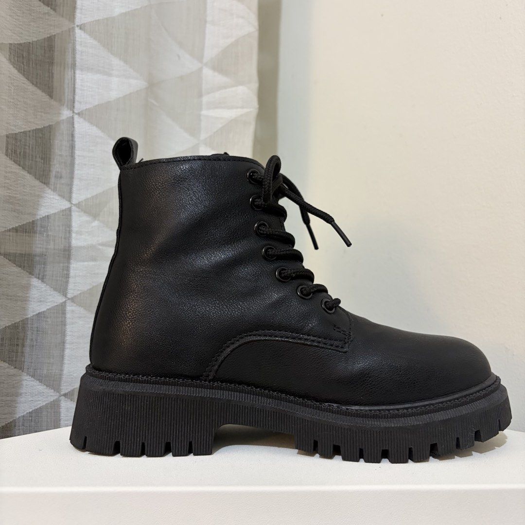 Black Combat Chunky Lace Up Boots (Category: Boots) located in Quezon City. Submitted by iywm_ (Listing ID 1469931215, Image 2). Description: ▪️used once for an event this october ▪️size 36 ▪️shipping via grab or lalamove only 📍loyola heights, qc.