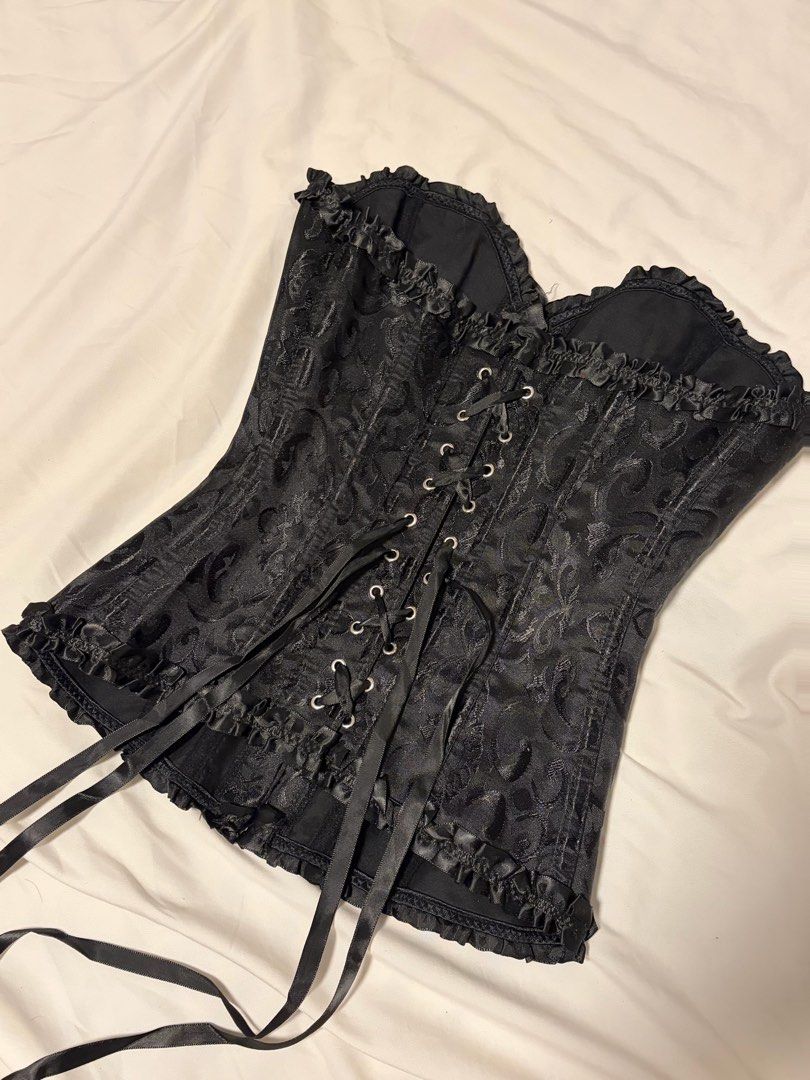 BLACK GOTHIC CORSET (Category: Others Tops) located in Manila. Submitted by rellasoli (Listing ID 1469864007, Image 2). Description: Black Gothic Corset 🖤 * Never worn, in excellent condition * Perfect for Halloween, gothic looks, or themed parties * Easy to style with skirts, pants, or layered outfits DISCLAIMER ♡ * All items are sold as is. * Please manage your expectations. * No returns, refunds, or exchanges for change of mind. * Review phot