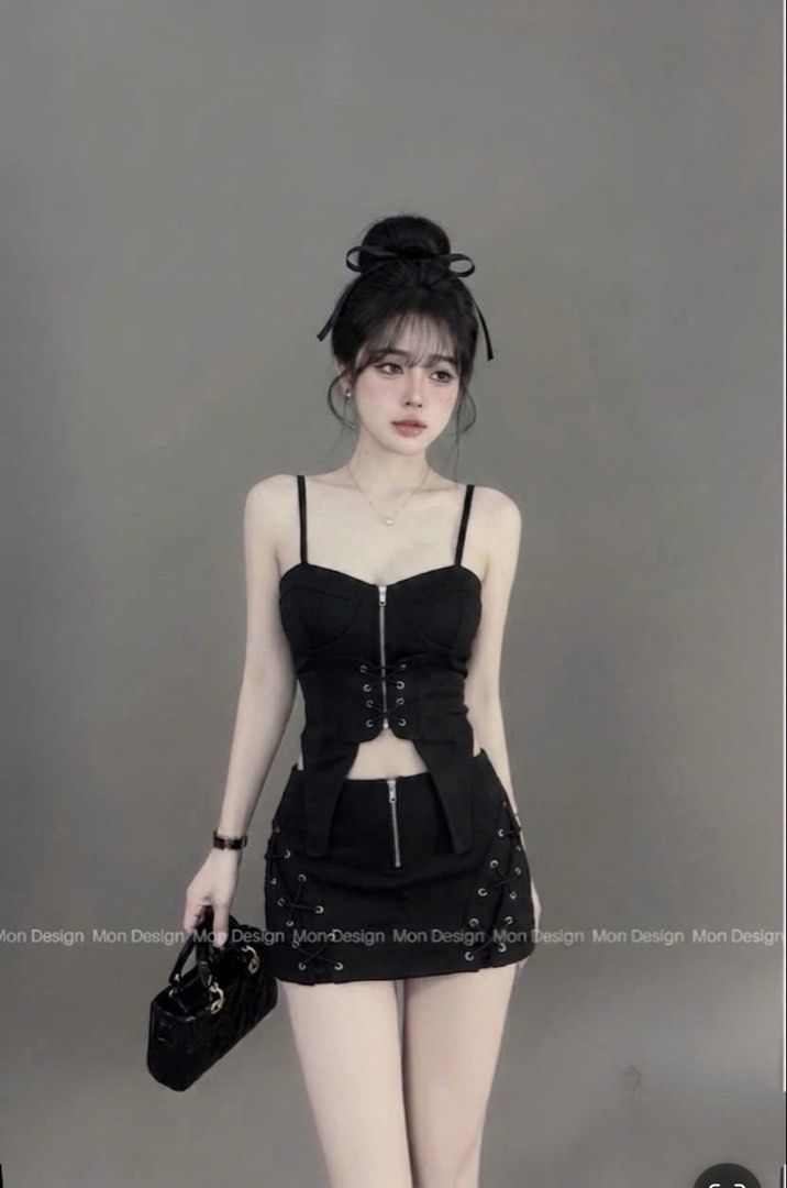 Black gothic crop top and mini skirt set (Category: Sets or Coordinates) located in Las Pinas. Submitted by niki.niki. (Listing ID 1469878043, Image 1). Description: - Style: Edgy goth Y2K two-piece outfit - Set includes: Corset-style crop top and matching mini skirt - Details: Front zippers and lace-up grommet details on the sides - Top features: Strapless design with added spaghetti straps - Perfect for: Parties, concerts, or statement streetwe
