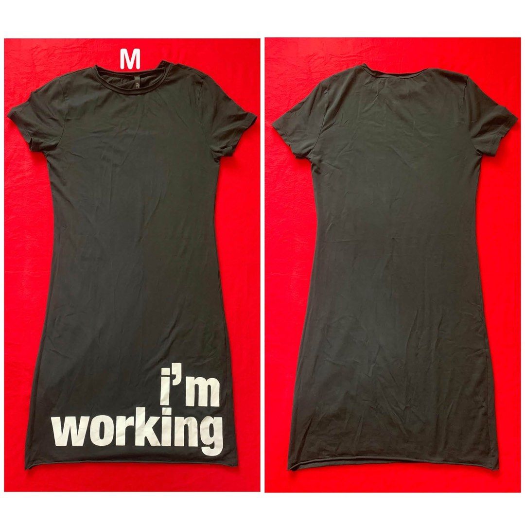 Black Graphic Tee Dress Size M (Category: Dresses) located in Pagadian. Submitted by cassiopeia.aphrodite458 (Listing ID 1469910695, Image 1). Description: - Color: Classic Black - Size: Medium - Design: 'i'm working' white graphic print on the front, plain back - Fit: Straight cut, casual style, effortless slip-on wear - Fabric: Soft and comfortable material - Condition: Brand new / Excellent (Ready to ship!).