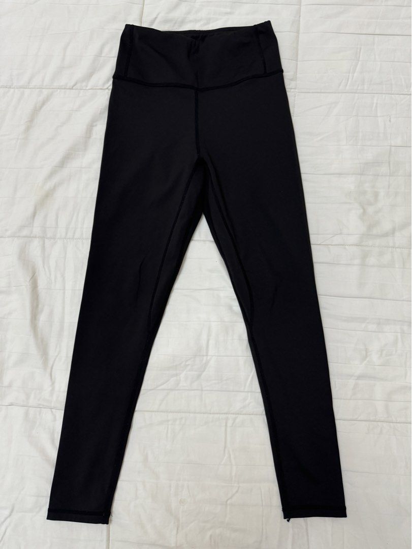 Black high-waisted activewear leggings (Category: Activewear) located in Quezon City. Submitted by m3gan8 (Listing ID 1469787730, Image 1). Description: - Color: Solid black - Fit: High-waisted, full length - Material: Stretchy and comfortable - Ideal for: Workouts or casual lounging - Details: Clean stitching, easy to match - Environment: Smoke-free home.