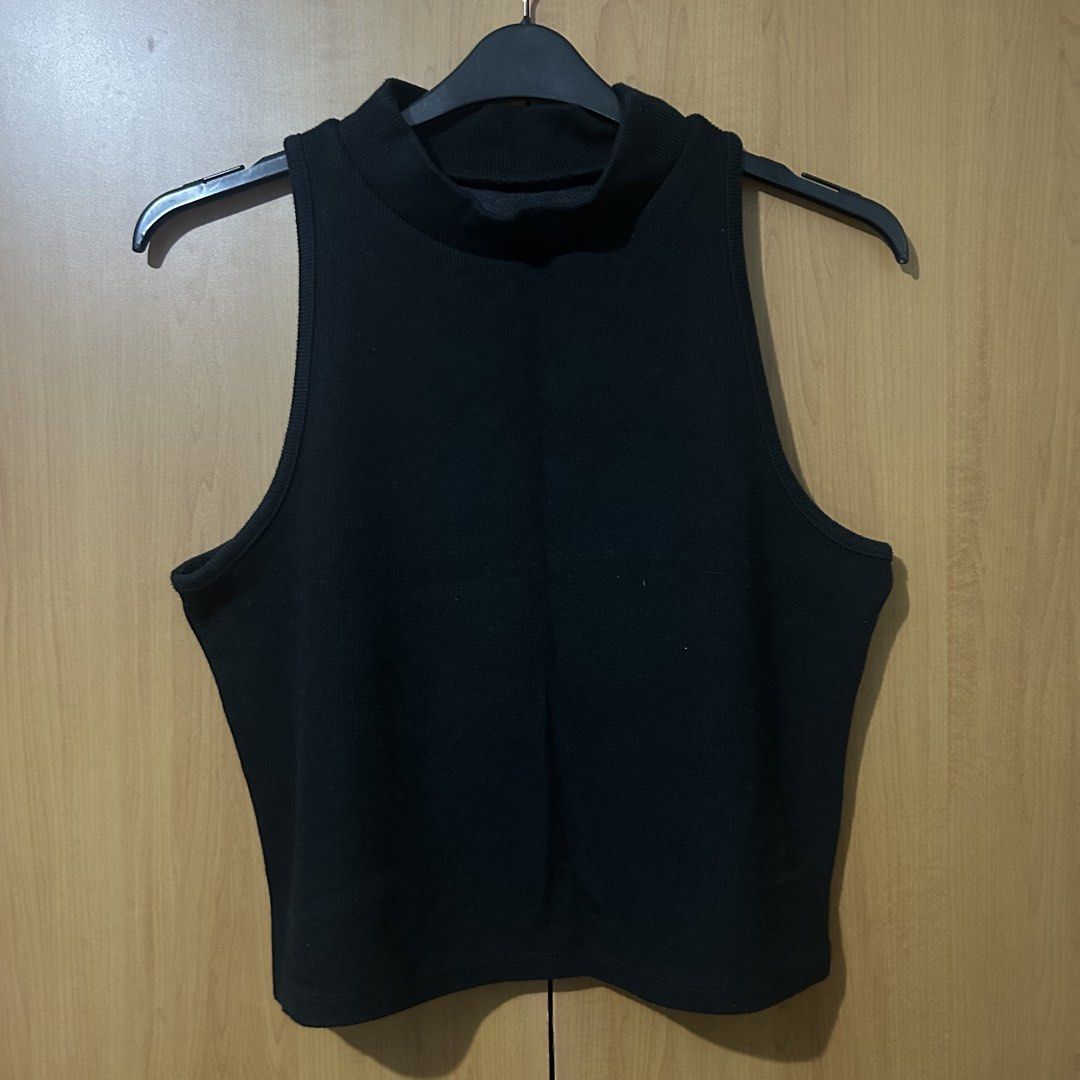 Black Mock Neck Tank Top (Category: Sleeveless) located in Mandaluyong City. Submitted by vwonu (Listing ID 1469859494, Image 1). Description: - Brand: A New Day - Style: Mock neck tank top - Color: Black - Size: XL - Material: Ribbed knit - Condition: Great basic piece for layering or standalone wear.