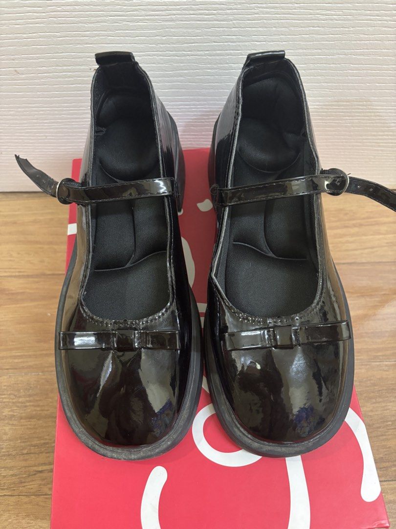 Black Patent Mary Jane Platform Heels with Bow (Category: Heels) located in Manila. Submitted by vegajhasse57128 (Listing ID 1469893166, Image 1). Description: - Style: Black patent Mary Jane flats/heels - Heel Height: Around 2 inches (chunky block heel for stability) - Closure: Strap with metal buckle across the top - Details: Adorable small bow on the rounded toe Deal Details & Delivery Location / Pickup: Pasig / Metro Manila Shipping/Delivery: