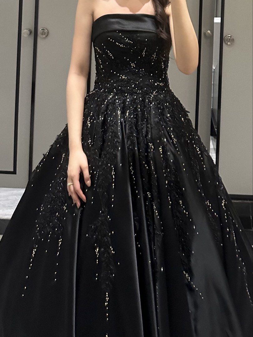 Black strapless ball gown with beading and glitter (Category: Evening dresses & gowns) located in Manila. Submitted by denise805 (Listing ID 1469887191, Image 2). Description: - Elegant black strapless gown with a dramatic, voluminous skirt - Features sparkling beading and delicate floral lace appliques on the bodice and skirt - Satin-like fabric with a gorgeous silhouette and sheen - Worn only once for a special occasion.