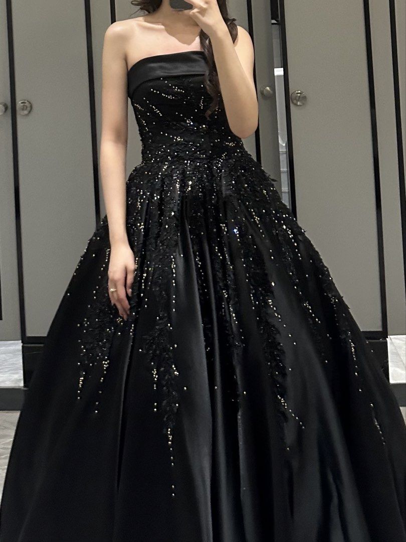Black strapless ball gown with beading and glitter (Category: Evening dresses & gowns) located in Manila. Submitted by denise805 (Listing ID 1469887191, Image 1). Description: - Elegant black strapless gown with a dramatic, voluminous skirt - Features sparkling beading and delicate floral lace appliques on the bodice and skirt - Satin-like fabric with a gorgeous silhouette and sheen - Worn only once for a special occasion.