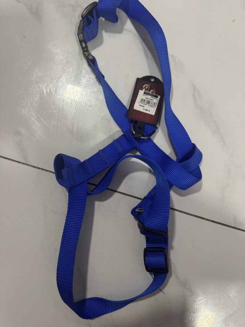 Blue Dog Harness with Tag ACE HARDWARE PET (Category: Sleeveless) located in Manila. Submitted by decluterthings888 (Listing ID 1469823105, Image 1). Description: - Condition: Brand new with original store tag attached - Material: Sturdy bright blue nylon webbing - Fit: Fully adjustable straps with secure black plastic buckles - Hardware: Durable metal D-ring for safe leash attachment - Usage: Never used, perfect for daily walks M-L FIT .