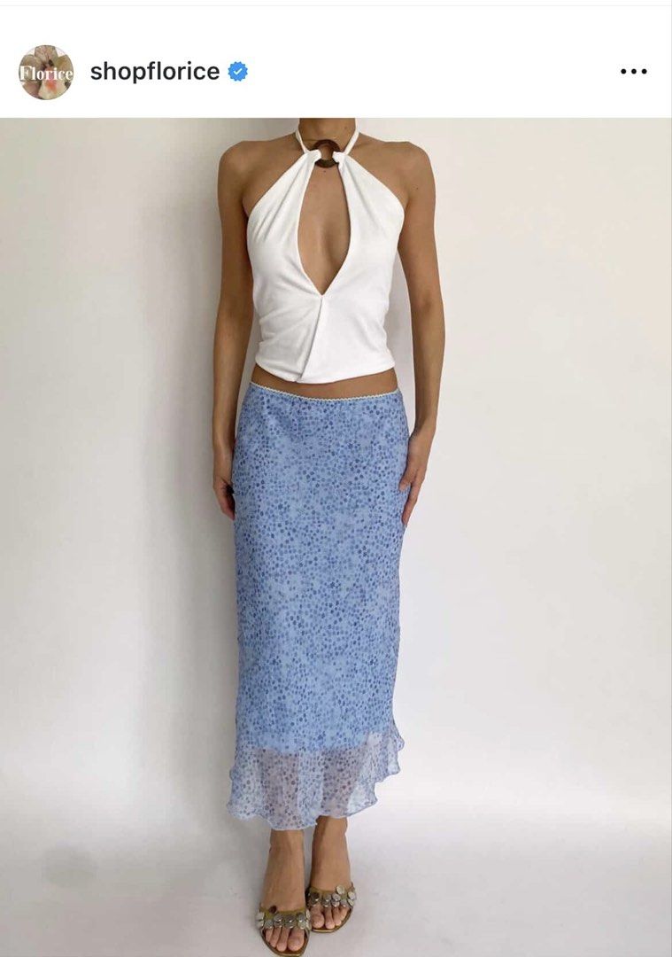 Blue floral midi skirt (Category: Skirts) located in Quezon City. Submitted by mminx (Listing ID 1469913367, Image 1). Description: Thrifted from shopflorice on ig Very flattering fit, it falls and frills nicely Probably handmade One of my favorites.