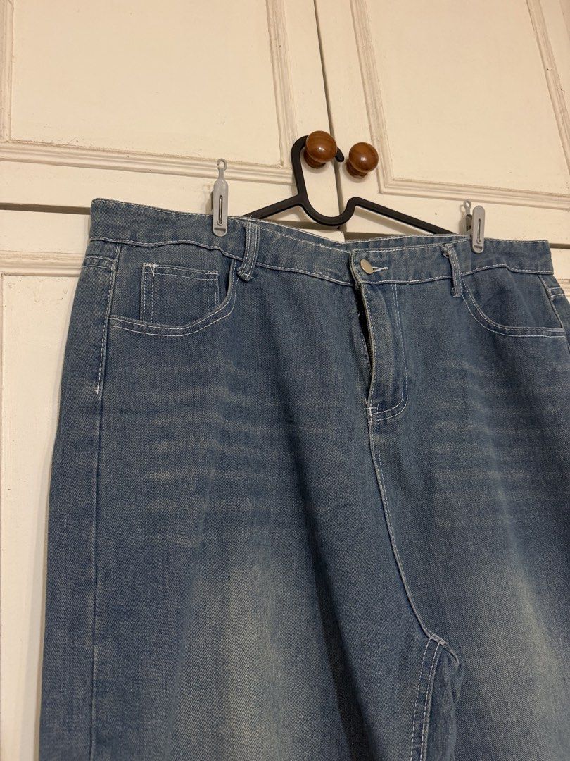 Blue Wide Leg Denim Jeans (Category: Jeans) located in Rizal. Submitted by rianaht (Listing ID 1469932406, Image 2). Description: - Color: Blue with stylish contrast white stitching - Waist: 20 inches - Length: 38 inches - Waist: Mid to high rise with front button and zip closure - Fit: Relaxed straight fit with wide legs for all-day comfort - Design: Classic five-pocket functionality - Condition: Brand new and ready to wear - Perfect basic piece