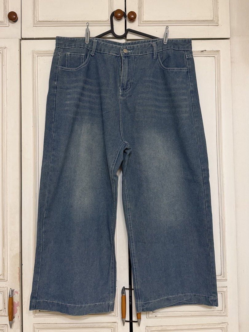 Blue Wide Leg Denim Jeans (Category: Jeans) located in Rizal. Submitted by rianaht (Listing ID 1469932406, Image 1). Description: - Color: Blue with stylish contrast white stitching - Waist: 20 inches - Length: 38 inches - Waist: Mid to high rise with front button and zip closure - Fit: Relaxed straight fit with wide legs for all-day comfort - Design: Classic five-pocket functionality - Condition: Brand new and ready to wear - Perfect basic piece