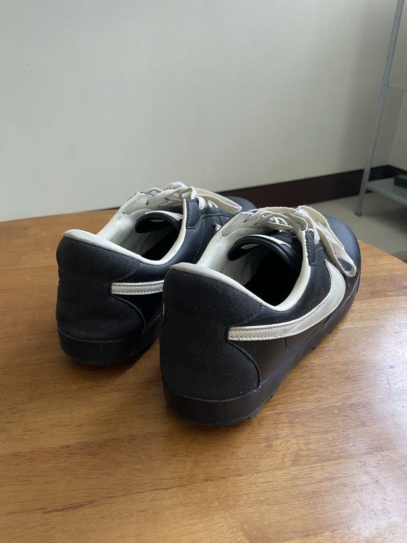 Bode Nike Astro Grabber (Category: Sneakers) located in Pasig City. Submitted by erzvgo (Listing ID 1469823194, Image 3). Description: Nike x Bode Astro Grabber sneakers Size 10, great condition Leather upper with white contrast swoosh, cream laces, and branding on tongue. Unique charm attachments included on the laces. Suede heel detail. Buyer handles delivery from Makati.
