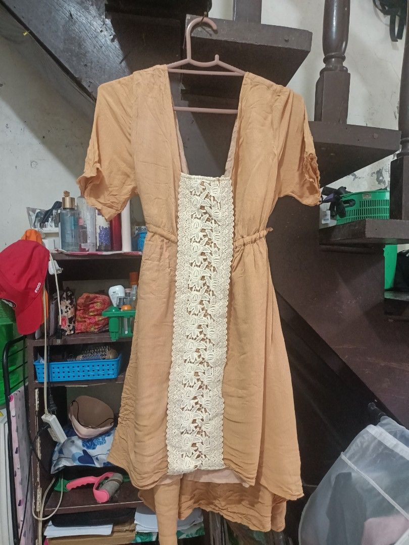 Boohoo's Caramel Dress (Category: Dresses) located in Manila. Submitted by clevertiger_069965 (Listing ID 1469793127, Image 1). Description: Cute brown boho-style dress with a beautiful cream crochet lace detail in the front, short puff sleeves, and a flattering cinched waist. Perfect for a soft, vintage-inspired and feminine look! • Color: Caramel Brown • Design: Crochet lace panel, cinched waist • Sleeves: Short puff sleeves • Style: Vintage / 