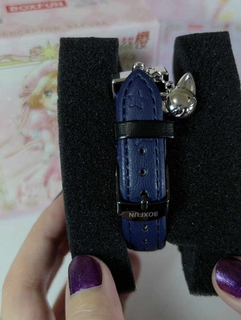 BOXFUN Cardcaptor Sakura Spinel Watch (Category: Women's Watches) located in Pasig City. Submitted by ccsakura4 (Listing ID 1469848056, Image 3). Description: - Authentic Boxfun Cardcaptor Sakura themed wristwatch - Dark blue leather strap - Light blue dial featuring Spinel in the center with sparkling crystals around the bezel - Brandnew. Box opened only to check the design since this is a random box..