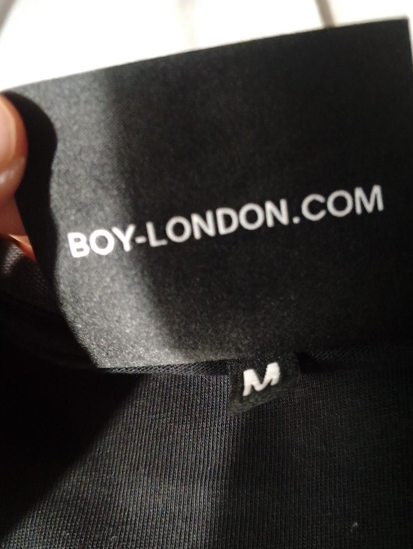 BOY London Black Eagle Graphic Tee Medium (Category: Tshirts & Polo Shirts ) located in Tanay. Submitted by _justdothrift (Listing ID 1469916823, Image 3). Description: - Brand: BOY London - Color: Black with white chest graphic - Size: Medium (tag attached) - Material: Soft and breathable cotton - Fit: Regular short sleeve cut - Condition: Clean, excellent overall condition with legible wash tags.