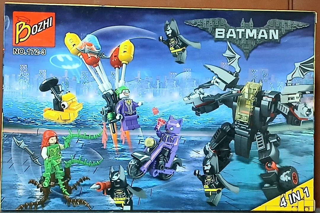 Bozhi Batman Building Blocks Set NO.172 (Category: Lego & Building Sets) located in Manila. Submitted by brunobeaut55620 (Listing ID 1469873680, Image 2). Description: - Brand: Bozhi Batman 4-in-1 Building Blocks Set. Sold as a set of 4 boxes. - Includes 8 Minifigures: Batman, The Joker, Catwoman, The Penguin, and Poison Ivy - Build exciting vehicles, boats, and action figures 4 in 1 Box set. Build 4 individual Batman themed vehicles or combine t