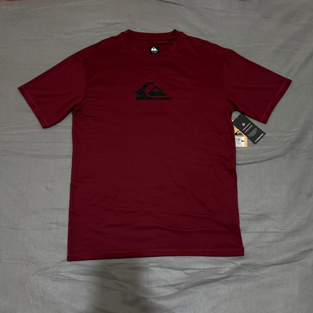 (Brand New) Quiksilver Mens Solid Streak Surf Shirt - Ruby Wine (US Size Medium) (Category: Swim Top & Rash Guards) located in Makati City. Submitted by Xerberus (Listing ID 1469862199, Image 2). Description: (Brand New) Quiksilver Mens Solid Streak Surf Shirt (US Size Medium) - Condition: Brand New (Unworn/Unused) - Colour: Ruby Wine - Solid - Fit: Loose fit - Size: Medium (US sizing - bigger than Asian sizing) - Cotton-feel recycled fabric - UP