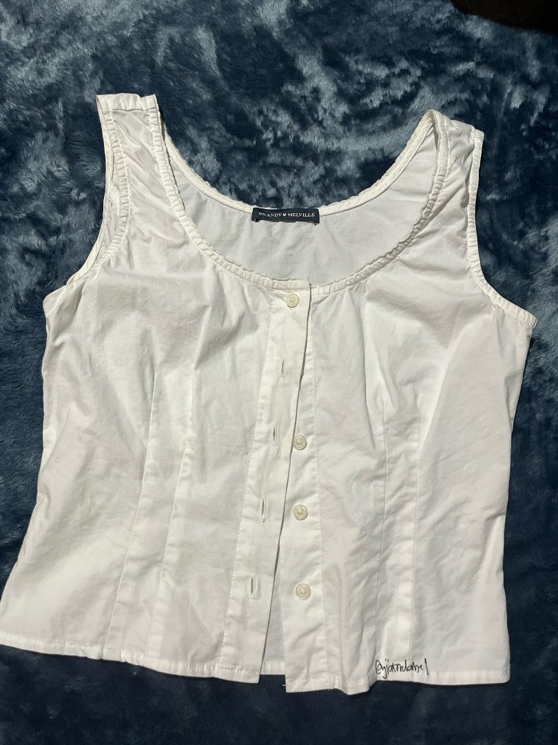 Brandy Melville White Button-Front Tank Top (Category: Sleeveless) located in San Juan, La Union. Submitted by gi4sprelovedklods (Listing ID 1469883870, Image 1). Description: ୨୧ ˚₊‧꒰ა clothing details & friendly reminders ໒꒱ ‧₊˚ ♡ please note that colors may slightly vary due to lighting and screen settings. thank you for understanding! 🎨 ♡ payment method: Gc4sh only 💸 ♡ shipping courier: J&T Express 📦 ♡ kindly double-check your order details