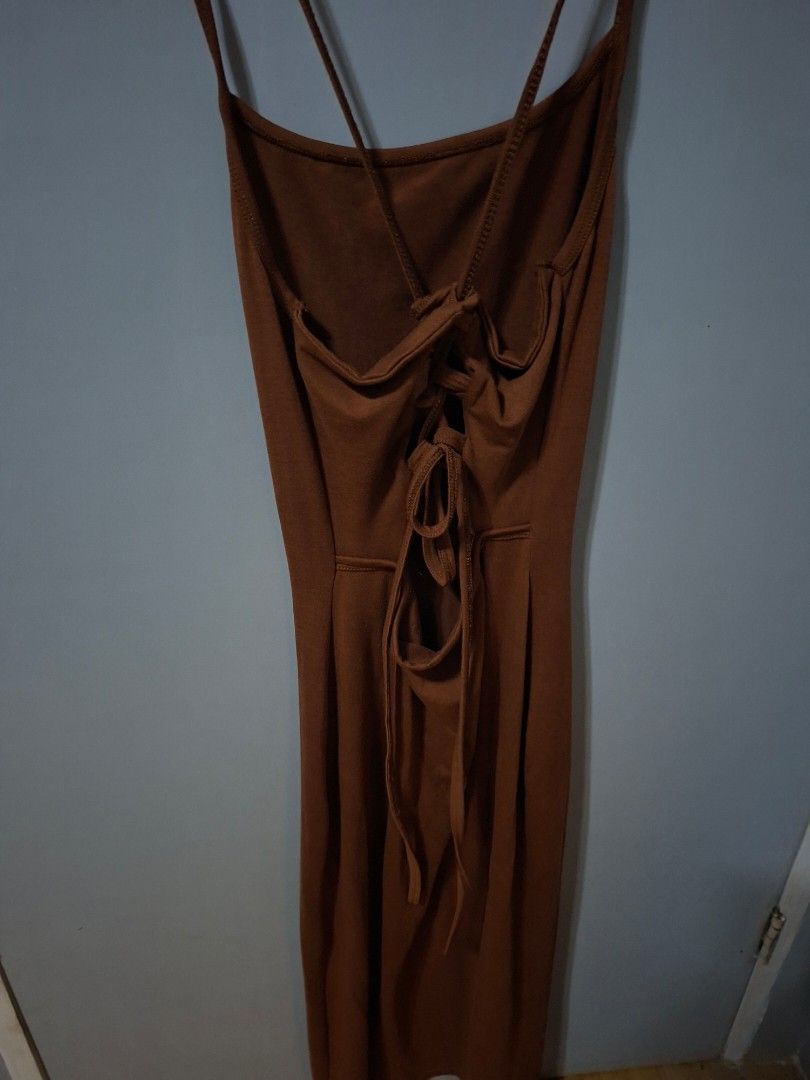 Brown Backless Dress (Category: Dresses) located in Cainta. Submitted by xxo.prelovedclothess (Listing ID 1469822735, Image 1). Description: ● Overall good/ Used this once only ● No longer needed it.