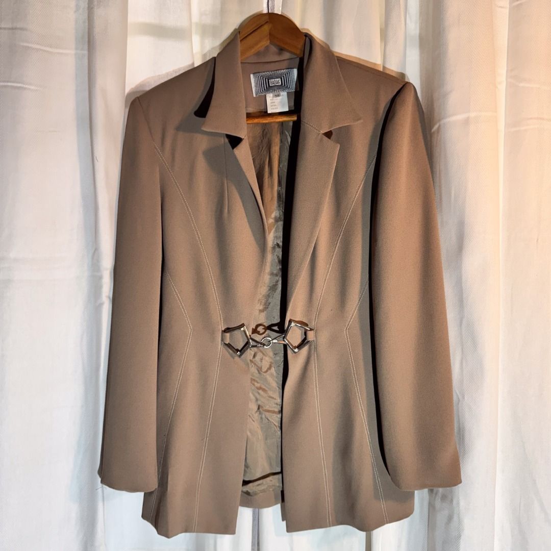 Brown Blazer - Babak (Category: Coats, Jackets and Outerwear) located in Marikina City. Submitted by repurpose_studio (Listing ID 1469782601, Image 1). Description: - Brand/Style: Babak Brown Blazer - Size: 38 - Closure: Unique geometric metal clasp with rhinestones - Sleeves: Long sleeves with decorative gem buttons on the cuffs - Details: Classic lapel collar, structured shoulders, and flattering front panel seaming - Interior: Fully lined Best