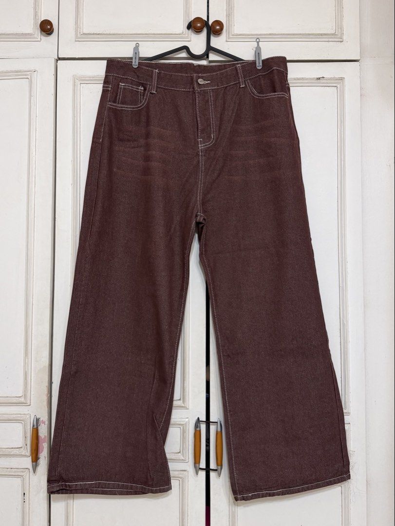 Brown wide leg denim jeans contrast stitching (Category: Jeans) located in Rizal. Submitted by rianaht (Listing ID 1469932411, Image 2). Description: - Waist: 19 inches - Length: 41 inches - Style: Wide-leg denim jeans - Color: Deep earth tone brown with contrast white stitching - Fit: High-waist with belt loops and front button closure - Havent been used 🌸 RFS: Decluttering 🌸 Delivery only to be shouldered by the buyer. 🌸 Payment via GCash / 