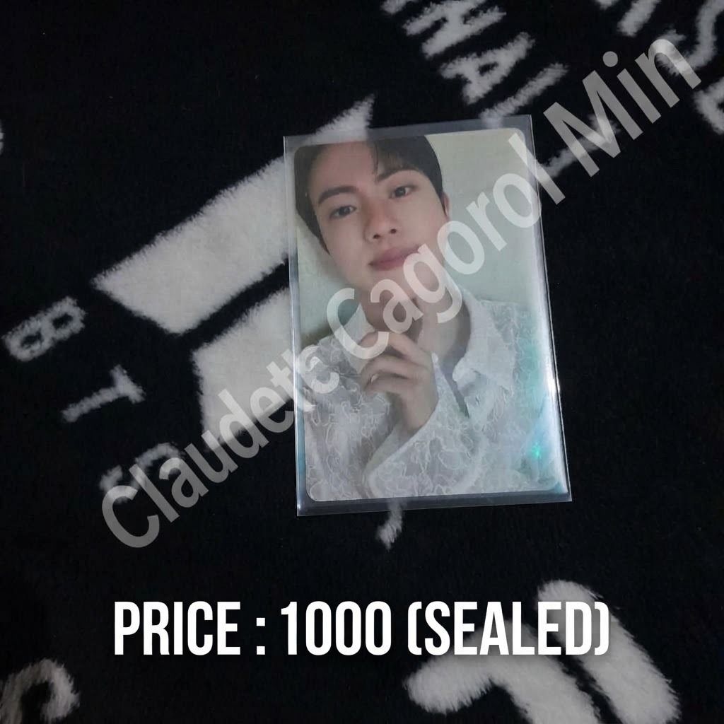 BTS Jin Photocards Sealed (Category: K-Wave Merchandise) located in Butuan. Submitted by justfabclauding (Listing ID 1469838906, Image 1). Description: - Item: BTS Jin Photocard - Price: ₱1,000 - Condition: Brand new, sealed in plastic sleeve, never opened - Perfect addition to any ARMY collection - Send a message if interested.