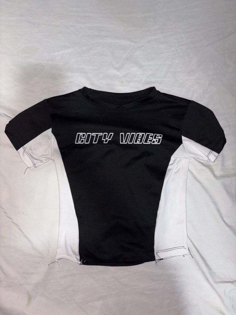 Y2K BUNDLE CROP TOPS (Category: Shirts) located in Makati City. Submitted by art_angel (Listing ID 1469790956, Image 1). Description: - ₱25 each - Bundle of 5 trendy cropped t-shirts in different styles - Black and white top with 'CITY VIBES' print - Plain mustard yellow ribbed top with a chic front cutout - White top with black trim and 'SPEED' text - Made with stretchy, comfortable fabric - Perfect for casual daily wear and streetwear outfits .