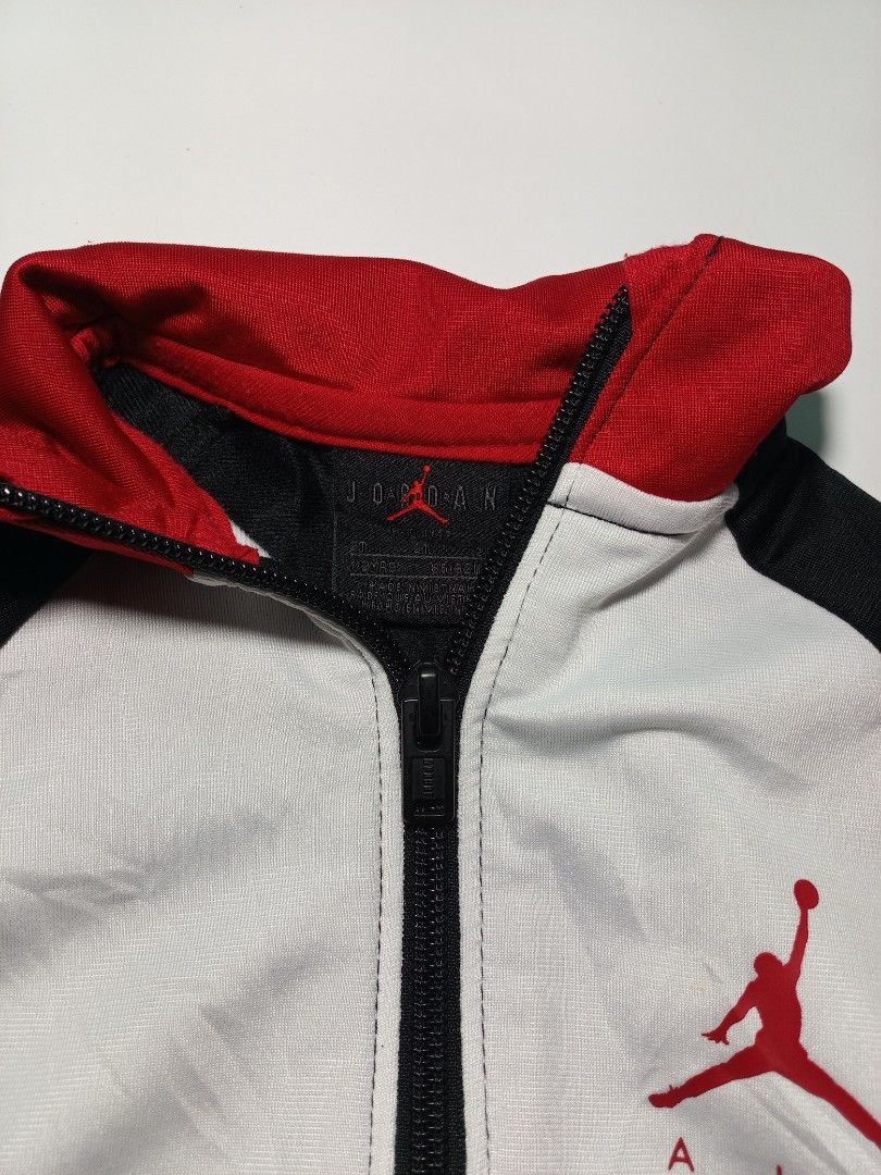 Bundle Jordan Toddler Jacket and Cap Set Size 2T (Category: Babies & Kids Fashion) located in Lucena. Submitted by sanera_23 (Listing ID 1469904621, Image 2). Description: Jordan jacket and matching snapback cap set for toddlers. Size 2T, fits sleeves. Includes a black baseball cap with embroidered red Jumpman logo on the front and adjustable strap at the back. Clean fabric tags inside both items..