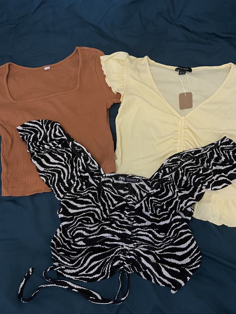 (BUNDLE) Top (Category: Sleeveless) located in Quezon City. Submitted by declutteringbyjam (Listing ID 1469790399, Image 1). Description: -preloved -medium -bundle for 400 -180 each -additional for sf.