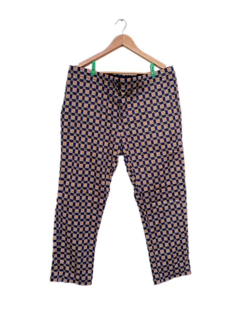 Burberry 2018 Equestrian Knight Check Trousers (Category: Luxury Apparel) located in Iloilo. Submitted by fukurou.vision (Listing ID 1469836632, Image 1). Description: Burberry 2018 Equestrian Knight Check Trousers Dimensions are in inches Waist - 37 Length - 36.5 Leg opening - 7.5 Buttons are Burberry Clasp is Burberry Cut tags These trousers originate from Burberry’s iconic late Christopher Bailey era, circa 2018, celebrating heritage house cod