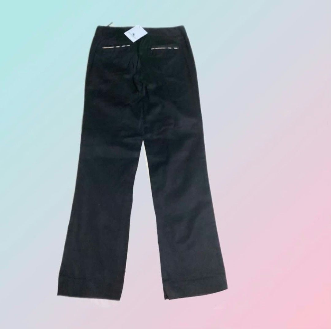 Burberry Dark Blue trousers with tags (Category: Trousers) located in Paranaque City. Submitted by calm_youngstore7 (Listing ID 1469849953, Image 2). Description: LAST PIECE SALE ! 80% OFF RETAIL! - Brand: Burberry - Color: Black - Condition: Brand new with tags (BNWT), never worn, pristine - Cut: Classic cut with clean lines and side pocket detail - Material: Premium fabric quality - Perfect for elevating your everyday wardrobe rotation.