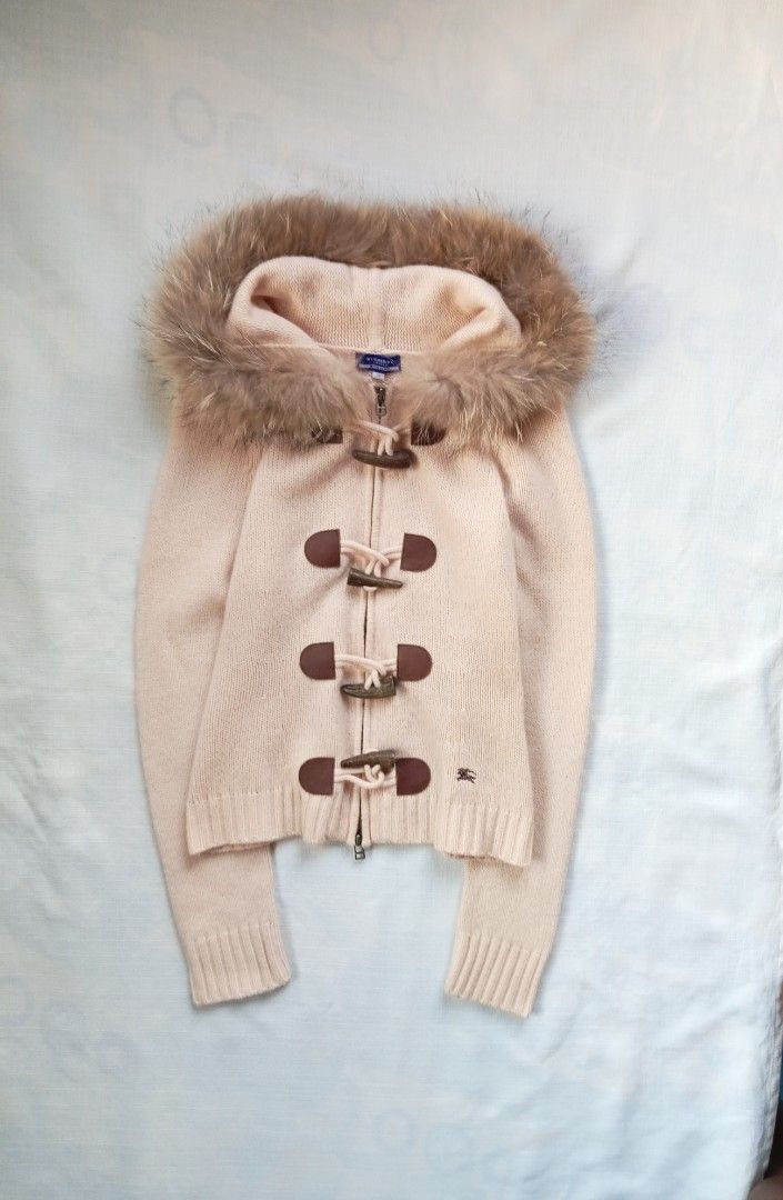 Burberry blue label toggle zip up knit jacket (Category: Luxury Apparel) located in Bagabag. Submitted by thrift_stories96 (Listing ID 1469883571, Image 1). Description: Burberry blue label toggle zip up knit jacket detachable hood Size 38 - medium frame Length - 22 Width - 17 stretch up to 18 Cloth material - knit stretchy Condition - excellent No flaw.