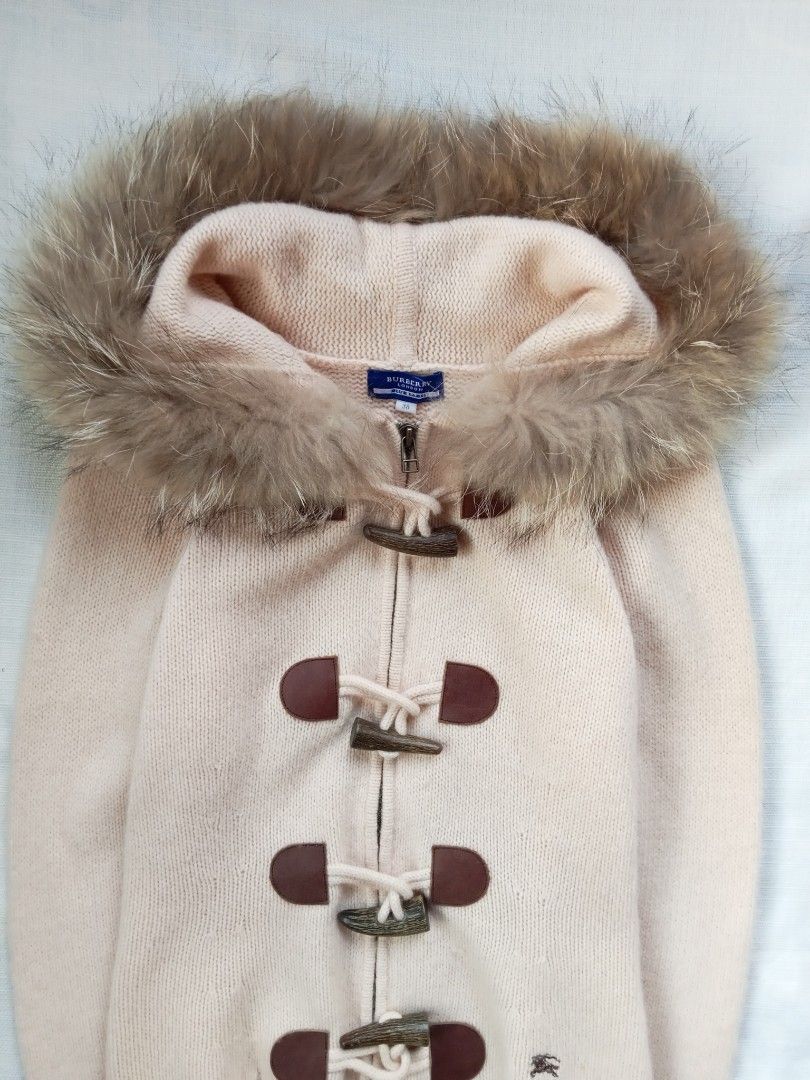 Burberry blue label toggle zip up knit jacket (Category: Luxury Apparel) located in Bagabag. Submitted by thrift_stories96 (Listing ID 1469883571, Image 2). Description: Burberry blue label toggle zip up knit jacket detachable hood Size 38 - medium frame Length - 22 Width - 17 stretch up to 18 Cloth material - knit stretchy Condition - excellent No flaw.