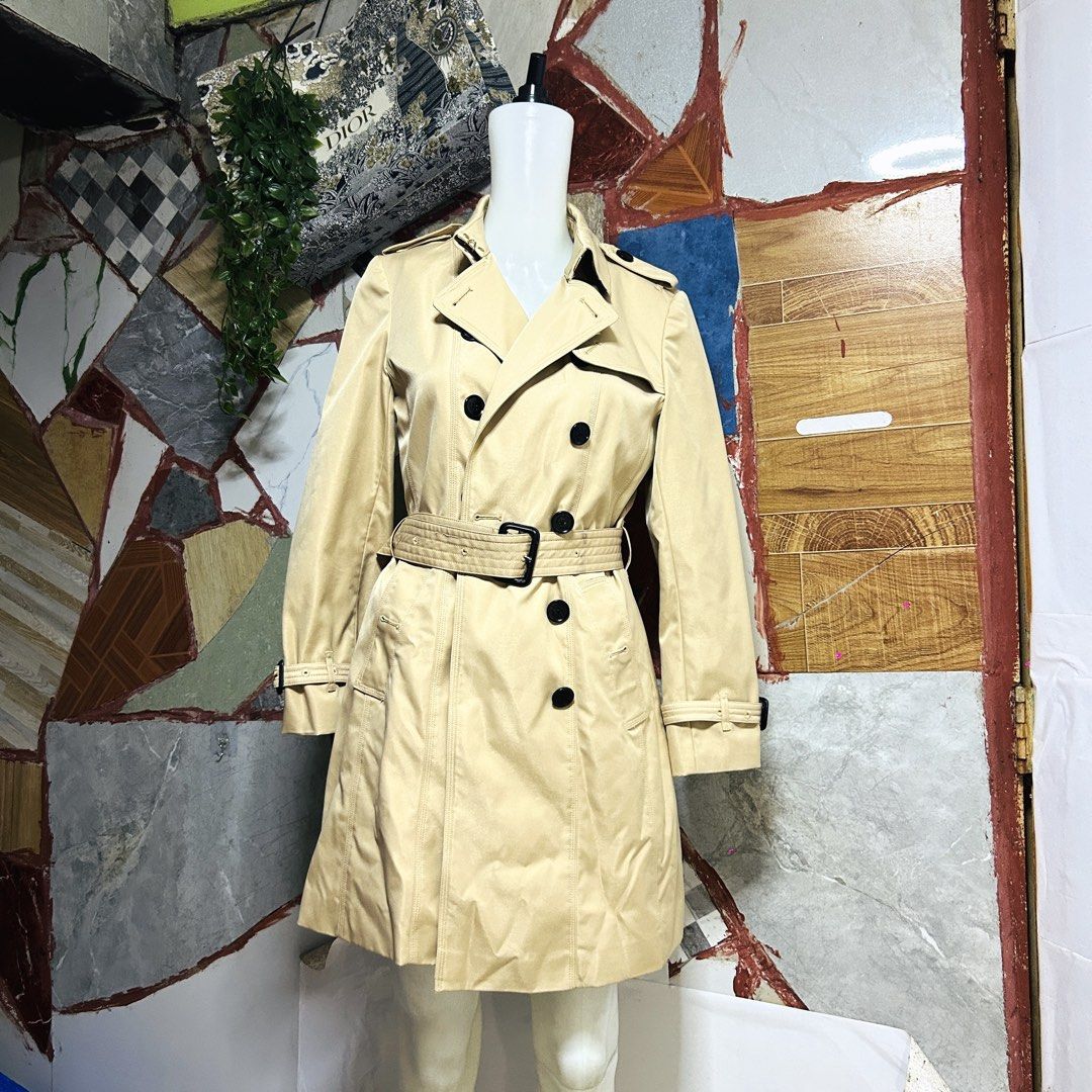 Burberry coat (Category: Luxury Apparel) located in Baguio. Submitted by kckc_luxury (Listing ID 1469916235, Image 2). Description: 🌸 TINY PINK SPOTS ARE LENS DAMAGE, NOT CLOTH STAINS ————————— ❗️KINDLY READ BEFORE MAKING AN OFFER❗️ LISTING DETAILS size:Small width x length (inches):18.5x34.5 condition: EXCELLENT --- MOP: Gcash / BPI MOD: J&T / JRS LOCATION: Baguio City --- NOTE: • Manage your expectations • Photos did not go under any edit but 