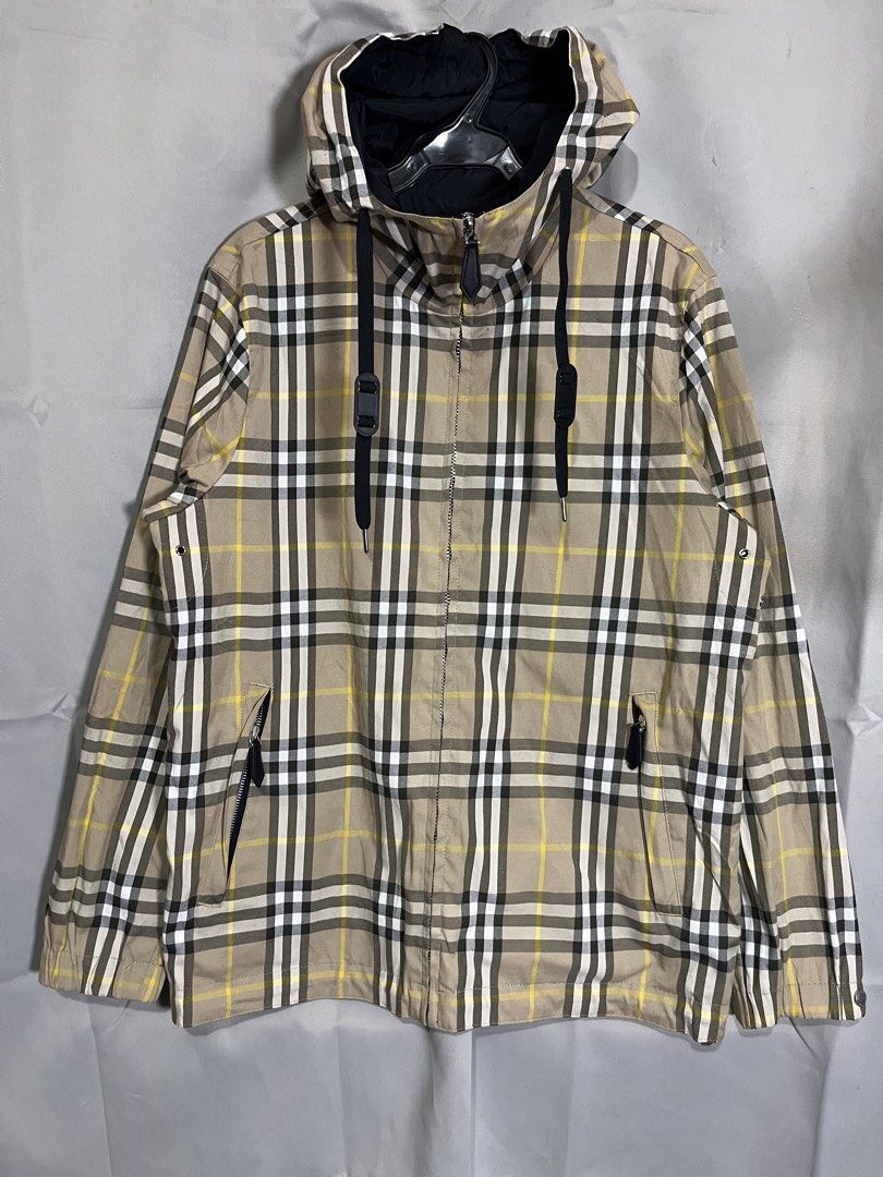 BURBERRY REVERSIBLE JACKET (Category: Luxury Apparel) located in Manila. Submitted by bibiies2.0xghettothrift (Listing ID 1469818088, Image 1). Description: Details W22 L28 Med to Large Loc.Baclaran Paranaque.