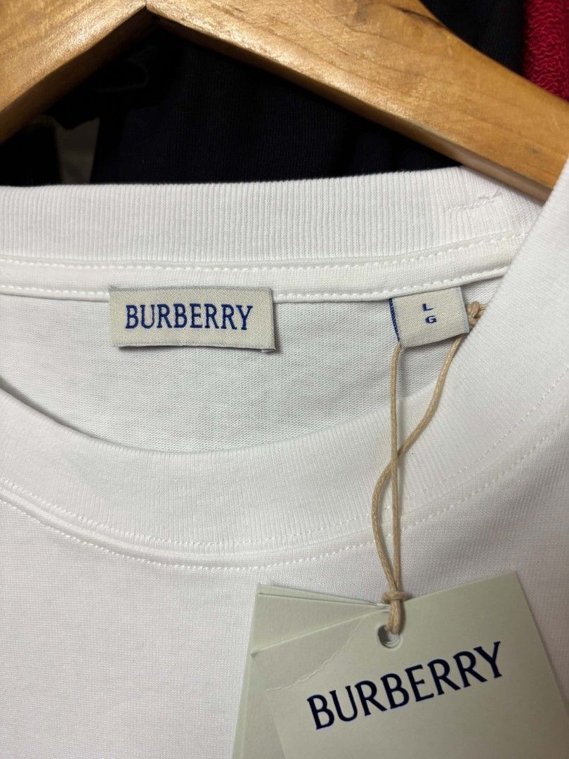 BURBVERY BIG LOGO NEW RELEASE (Category: Luxury Apparel) located in Navotas City. Submitted by DalVintage (Listing ID 1469930501, Image 3). Description: Burberry t shirt brand new from surplus with tags without packing authenticity not gurantee.