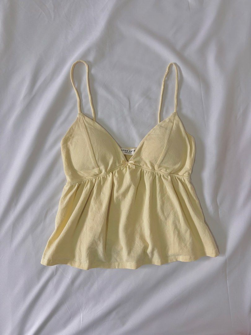 Butter Yellow Padded Cami Peplum Top (Category: Sleeveless) located in Bambang. Submitted by gigisells_ (Listing ID 1469904158, Image 1). Description: xs-m padded.