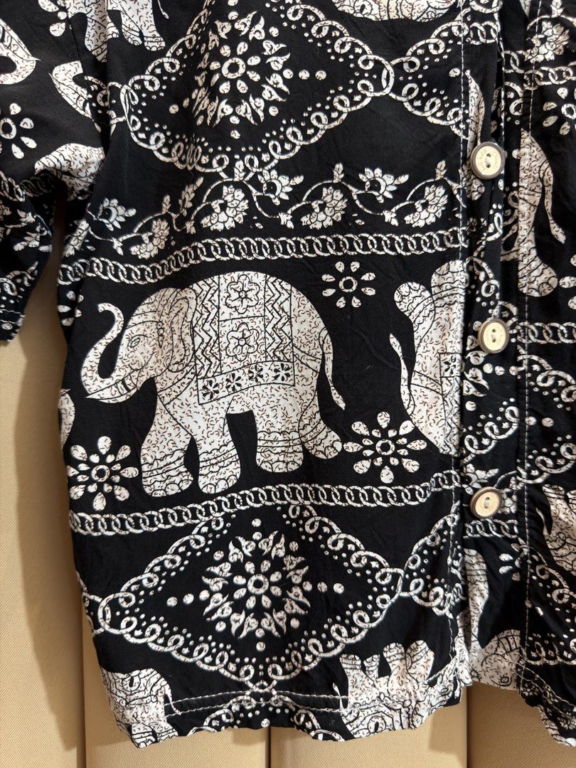 BUTTON-DOWN CROP TOP (Category: Blouses) located in Manila. Submitted by glamstylemnl (Listing ID 1469917323, Image 2). Description: ♡ SIZE: M ♡ BUST: 36 ♡ Swipe left to see the actual color & details ♡ traditional thai elephant and ornamental chain pattern, italian/japanese rayon ♡ HQ • 10/10 ♡ Ready to wear 👚.