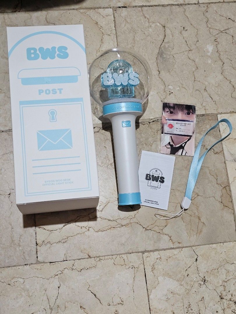 Byeon Woo Seok BWS Official Light Stick (Category: K-Wave Merchandise) located in San Mateo. Submitted by reyshel08 (Listing ID 1469849849, Image 3). Description: - Official Byeon Woo Seok merchandise light stick - Features BWS logo in clear dome with light blue handle and button - Tested and working properly - Includes original packaging box, wrist strap, user manual, and photocard - Must-have for fans and collectors.